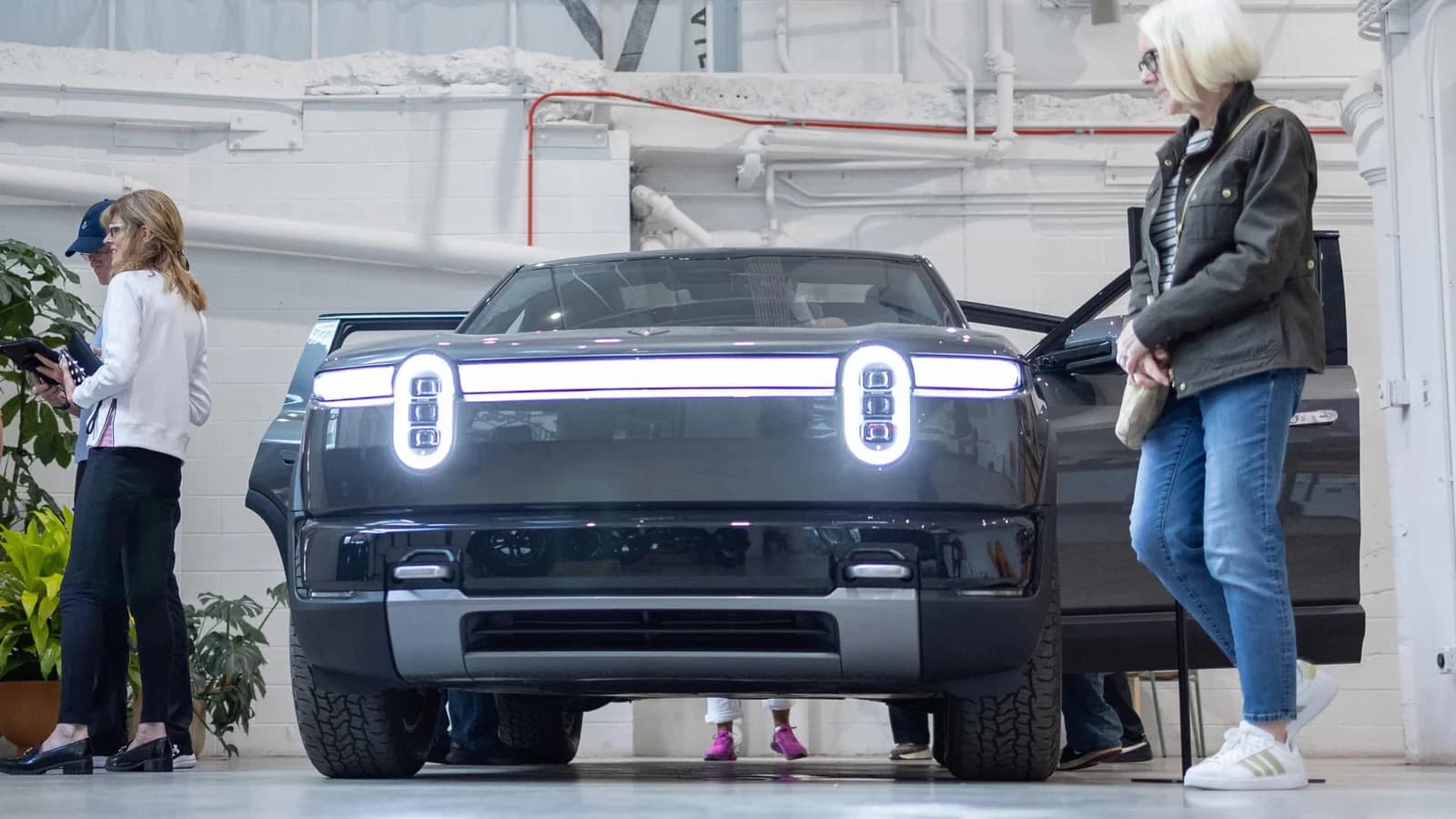 Rivian third-quarter earnings beat estimates as software revenue, R2 deliveries rise